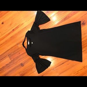 Black Calvin Klein swing sleeve crepe dress.  Excellent used condition.